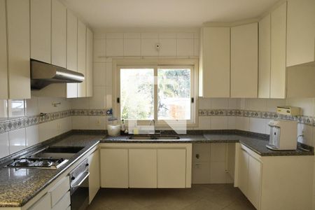 Casa de condomínio para alugar com 449m², 4 quartos e 2 vagasCozinha