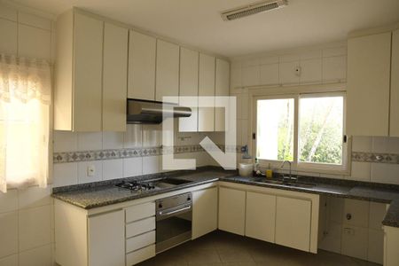 Casa de condomínio para alugar com 449m², 4 quartos e 2 vagasCozinha