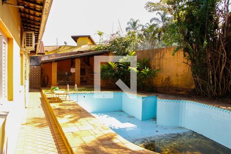 Casa de condomínio à venda com 403m², 4 quartos e 4 vagas Casa de condomínio à venda com 403m², 4 quartos e 4 vagasÁREA EXTERNA FUNDOS