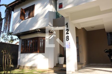 Casa de condomínio para alugar com 630m², 4 quartos e 5 vagasFachada