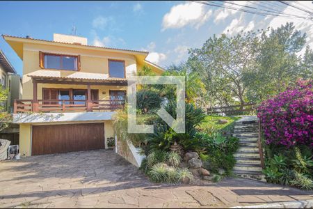 Casa de condomínio à venda com 389m², 4 quartos e 5 vagasFachada da Casa