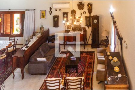 Casa de condomínio à venda com 389m², 4 quartos e 5 vagasDetalhe Sala Intima