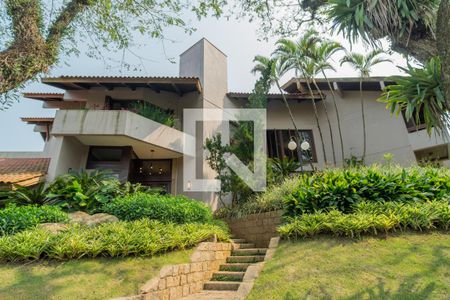 Casa de condomínio para alugar com 1400m², 8 quartos e 4 vagasFachada