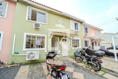 Casa de condomínio à venda com 80m², 3 quartos e 1 vaga Casa de condomínio à venda com 80m², 3 quartos e 1 vagaFachada da casa