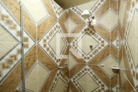 Casa à venda com 410m², 4 quartos e 5 vagasBanheiro da suíte