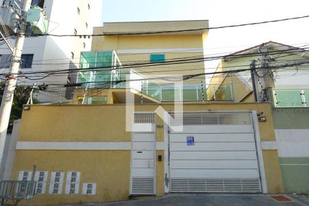 Casa de condomínio à venda com 47m², 2 quartos e 1 vagaFachada do condomínio - Placa instalada no portão do condomínio