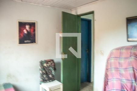 Quarto 2 de casa à venda com 5 quartos, 200m² em Vila São José, Porto Alegre