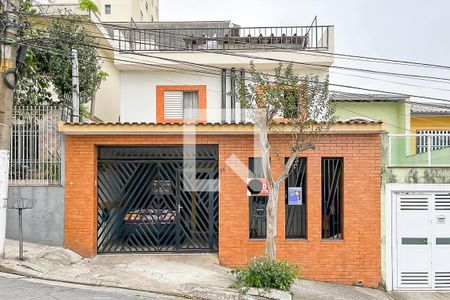 Casa à venda com 200m², 3 quartos e 2 vagasFachada + plaquinha