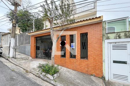 Casa à venda com 200m², 3 quartos e 2 vagasFachada + plaquinha
