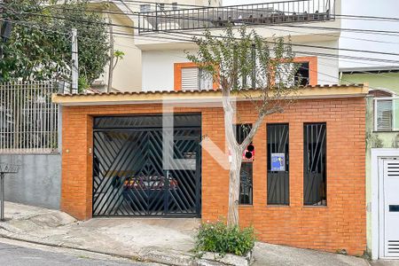 Casa à venda com 200m², 3 quartos e 2 vagasFachada + plaquinha