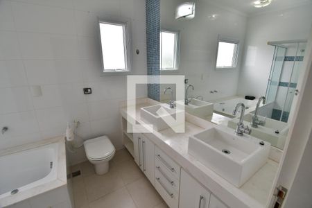 Casa de condomínio à venda com 253m², 4 quartos e 4 vagasBanheiro 1