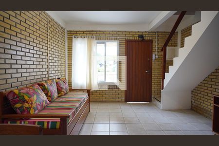 Sala de casa de condomínio para alugar com 2 quartos, 80m² em Barra da Lagoa, Florianópolis