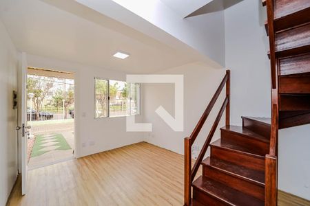 Sala de casa de condomínio à venda com 2 quartos, 85m² em Sarandi, Porto Alegre