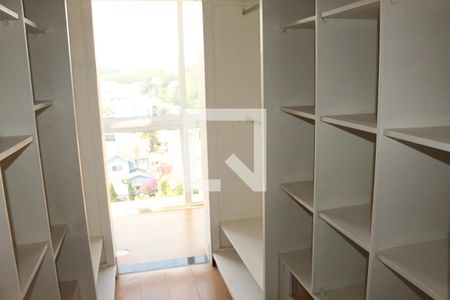 Casa de condomínio para alugar com 650m², 5 quartos e 4 vagasCloset da suíte