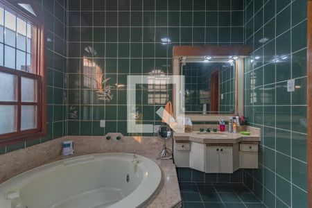 Casa à venda com 320m², 4 quartos e 4 vagasBanheiro Suíte 1