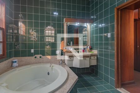 Casa à venda com 320m², 4 quartos e 4 vagasBanheiro Suíte 1