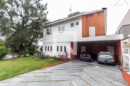 Casa de condomínio para alugar com 440m², 4 quartos e 4 vagasGaragem
