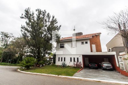 Casa de condomínio para alugar com 440m², 4 quartos e 4 vagasGaragem