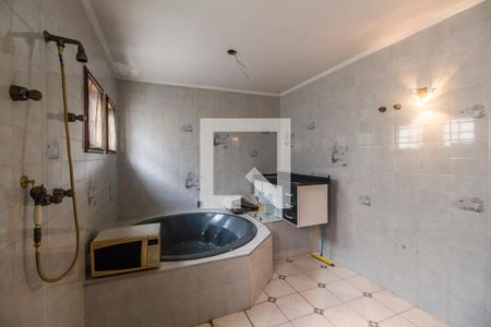 Casa de condomínio para alugar com 440m², 4 quartos e 4 vagasBanheiro da Suíte 1