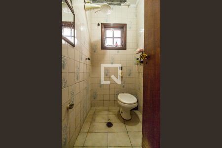 Casa de condomínio para alugar com 440m², 4 quartos e 4 vagasBanheiro de serviço