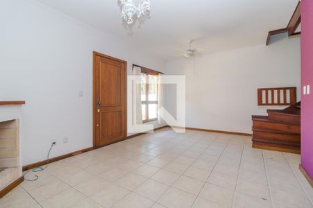 Sala de casa de condomínio à venda com 3 quartos, 147m² em Espírito Santo, Porto Alegre
