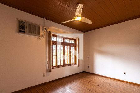Suíte 1 de casa à venda com 5 quartos, 218m² em Espírito Santo, Porto Alegre