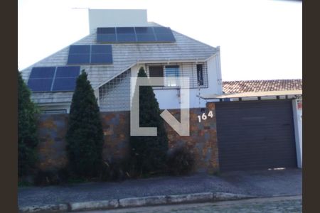 Casa à venda com 165m², 3 quartos e 1 vaga Casa à venda com 165m², 3 quartos e 1 vagaFachada