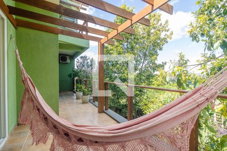 Varanda de casa à venda com 2 quartos, 299m² em Vila Nova, Porto Alegre