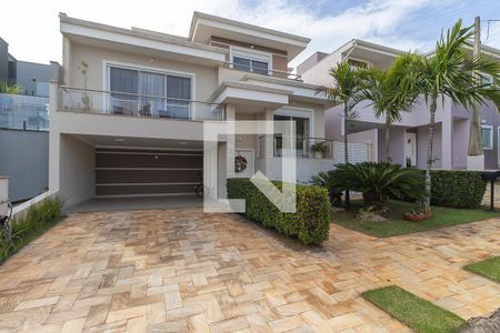 Casa de condomínio à venda com 352m², 4 quartos e 4 vagasFachada