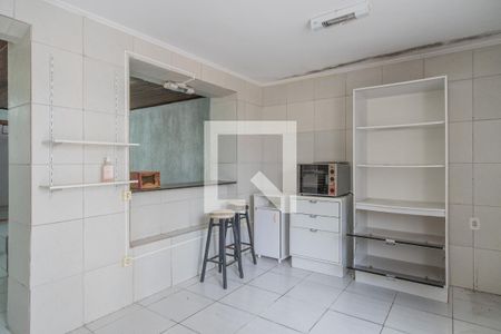 Casa à venda com 150m², 6 quartos e 4 vagas Casa à venda com 150m², 6 quartos e 4 vagasCozinha e Área de Serviço