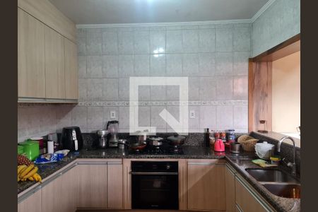 Casa à venda com 315m², 4 quartos e 4 vagas Casa à venda com 315m², 4 quartos e 4 vagasCozinha e Area Gourmet