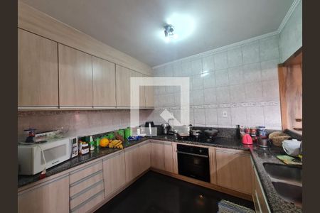 Casa à venda com 315m², 4 quartos e 4 vagas Casa à venda com 315m², 4 quartos e 4 vagasCozinha e Area Gourmet