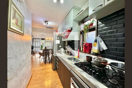 Casa de condomínio à venda com 130m², 2 quartos e 2 vagas Casa de condomínio à venda com 130m², 2 quartos e 2 vagasCozinha e Área de Serviço