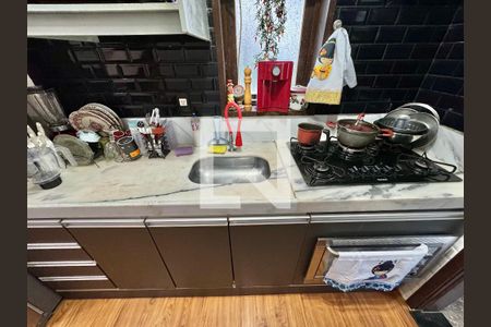 Casa de condomínio à venda com 130m², 2 quartos e 2 vagas Casa de condomínio à venda com 130m², 2 quartos e 2 vagasCozinha e Área de Serviço