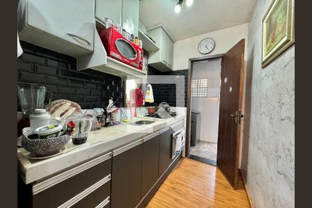 Casa de condomínio à venda com 130m², 2 quartos e 2 vagas Casa de condomínio à venda com 130m², 2 quartos e 2 vagasCozinha e Área de Serviço