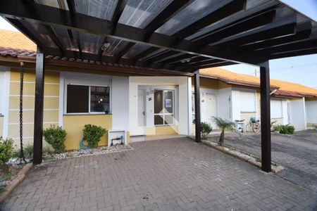 Casa de condomínio à venda com 80m², 2 quartos e 2 vagasFachada da casa