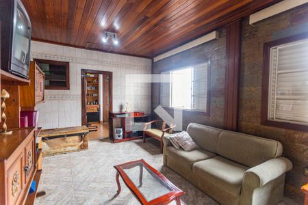 Casa à venda com 280m², 6 quartos e 3 vagas Casa à venda com 280m², 6 quartos e 3 vagasSala da Casa dos Fundos