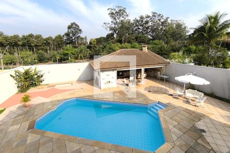 Casa de condomínio à venda com 590m², 4 quartos e 6 vagas Casa de condomínio à venda com 590m², 4 quartos e 6 vagasÁrea Externa