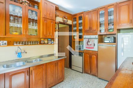 Casa à venda com 300m², 4 quartos e 4 vagas Casa à venda com 300m², 4 quartos e 4 vagasCozinha