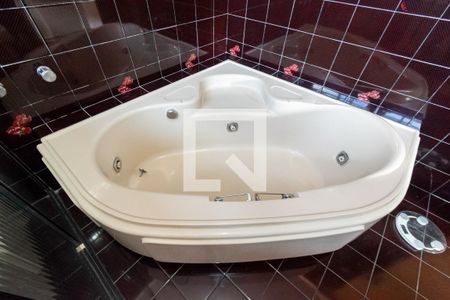 Casa à venda com 455m², 4 quartos e 6 vagas Casa à venda com 455m², 4 quartos e 6 vagasBanheiro da Suíte 1