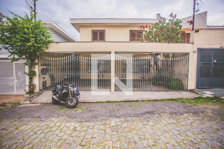 Casa de condomínio à venda com 293m², 5 quartos e 4 vagas Casa de condomínio à venda com 293m², 5 quartos e 4 vagasFachada