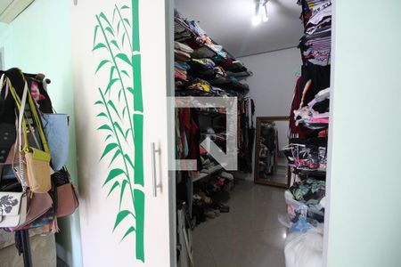 Casa de condomínio para alugar com 360m², 5 quartos e 2 vagasCloset da Suíte 3