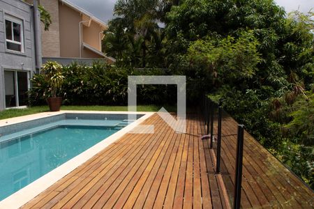 Casa de condomínio para alugar com 402m², 4 quartos e 3 vagasÁREA EXTERNA FUNDOS