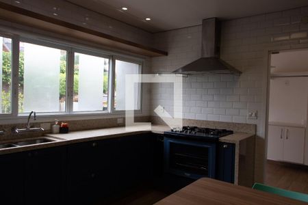 Casa de condomínio para alugar com 402m², 4 quartos e 3 vagasCOZINHA