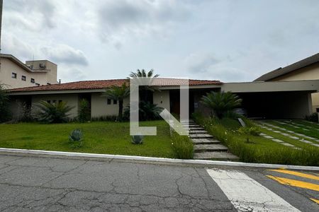 Casa de condomínio para alugar com 486m², 4 quartos e 8 vagasFachada