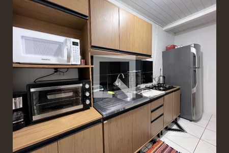 Casa à venda com 130m², 4 quartos e 2 vagas Casa à venda com 130m², 4 quartos e 2 vagasCozinha