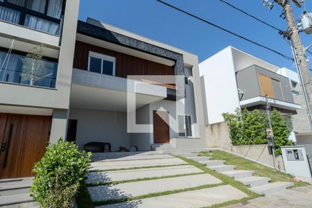 Casa de condomínio à venda com 200m², 3 quartos e 4 vagas Casa de condomínio à venda com 200m², 3 quartos e 4 vagasFachada