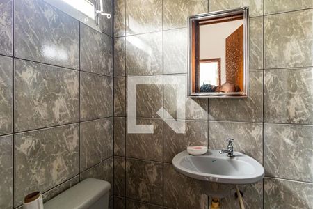 Casa de condomínio à venda com 310m², 4 quartos e 4 vagasBanheiro de serviço