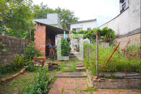 Casa à venda com 100m², 2 quartos e 2 vagasFachada Fundos