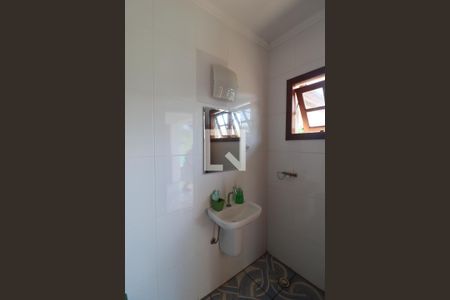 Casa de condomínio à venda com 600m², 4 quartos e 5 vagasBanheiro de Serviço